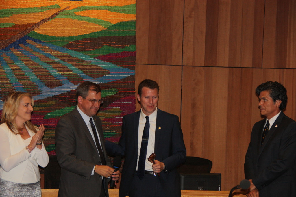 Joe Krovoza hands over the gavel to Dan Wolk as the baton is past to the next Mayor