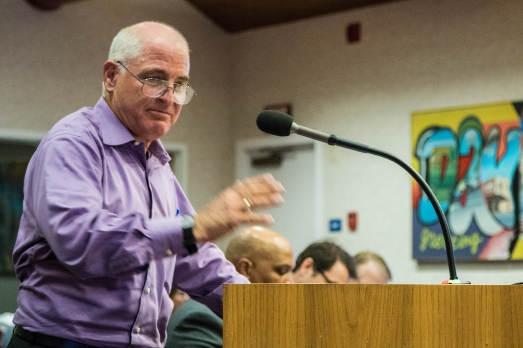 Alan Hirsch emphasizes a point during public comment