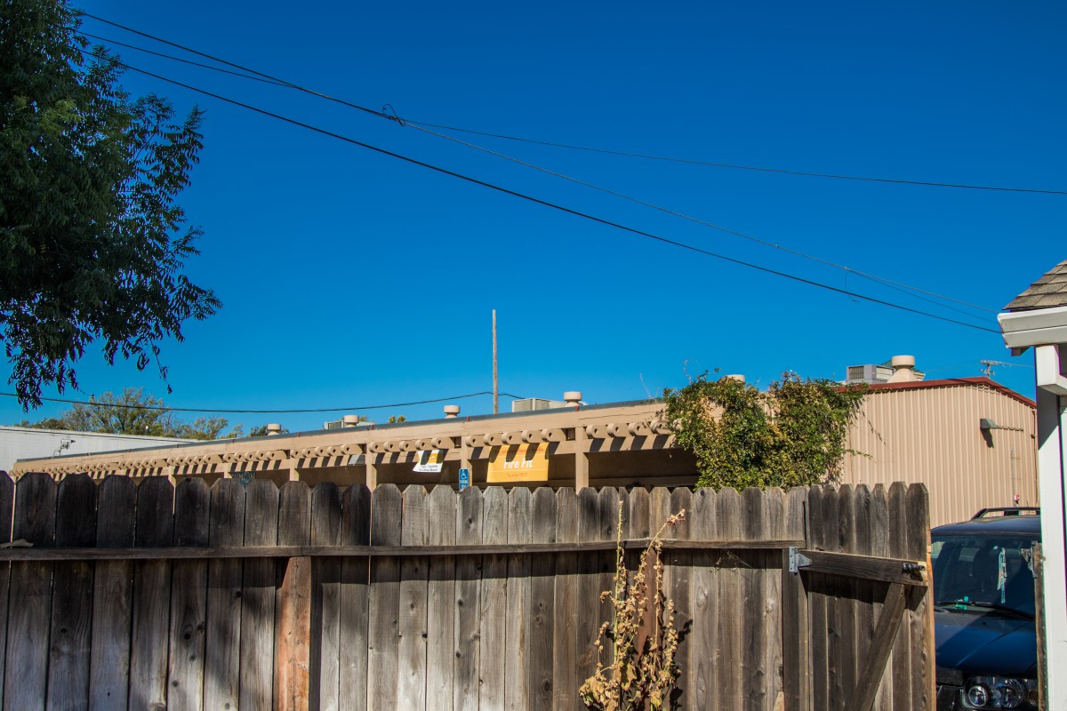 This is the view from the backyard of the neighbor located at the southeast corner of the alleyway