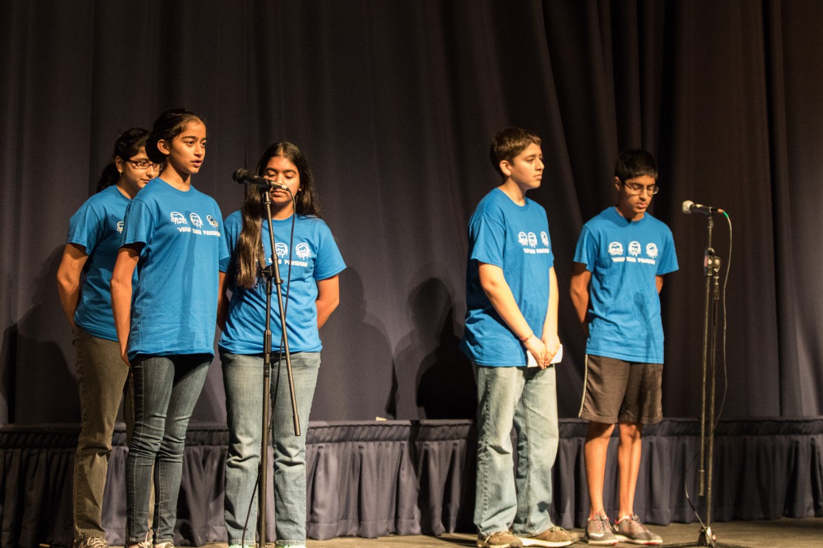 Harper Junior High students reading poetry