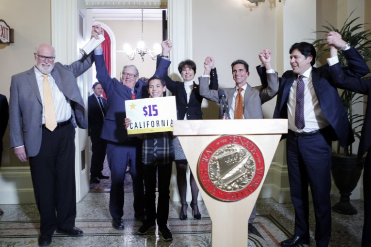 Senator Mark Leno and other sponsors celebrate the passage of SB 3 - Courtesy Photo